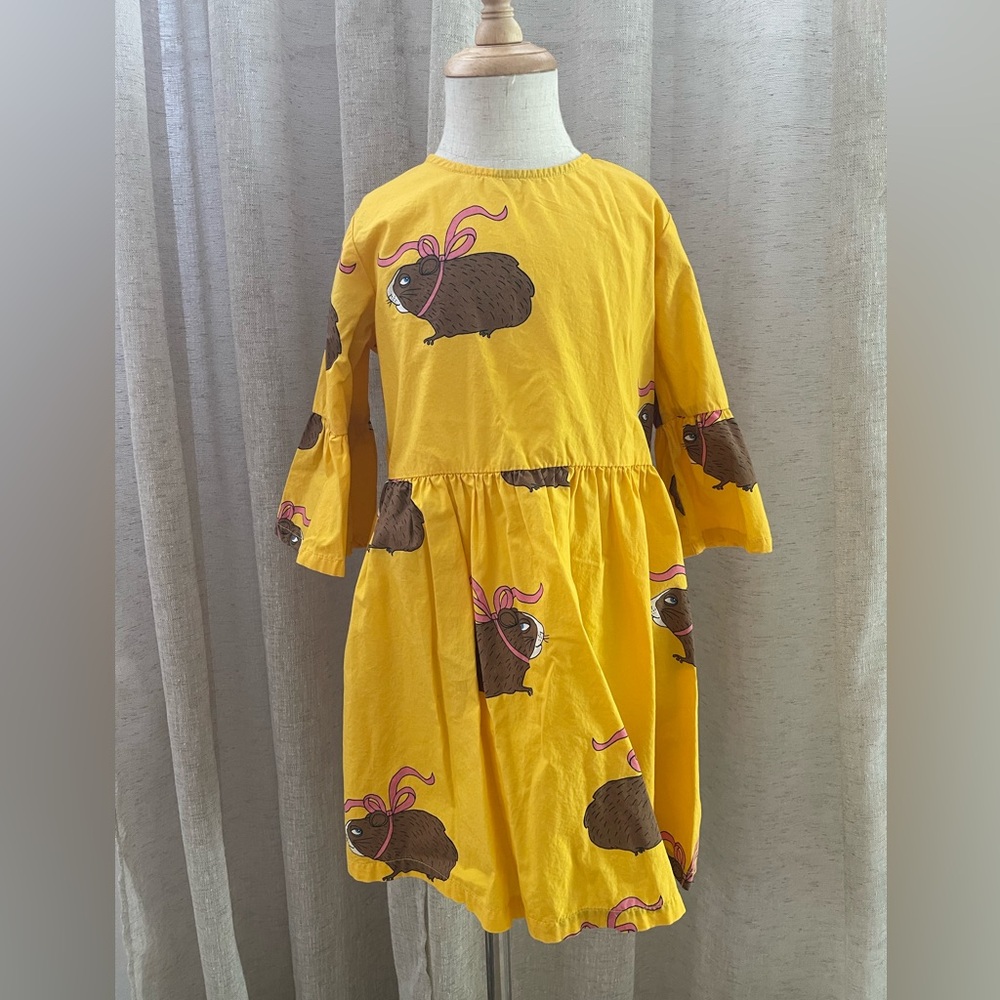 Min Rodini
Yellow Dress with Animal Print